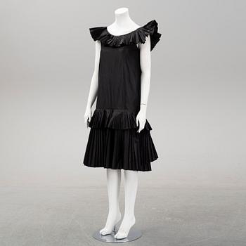 Christian Dior, a silk dress and straw hat, circa size S.