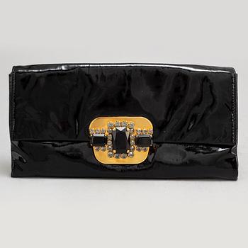 PRADA, a clutch.