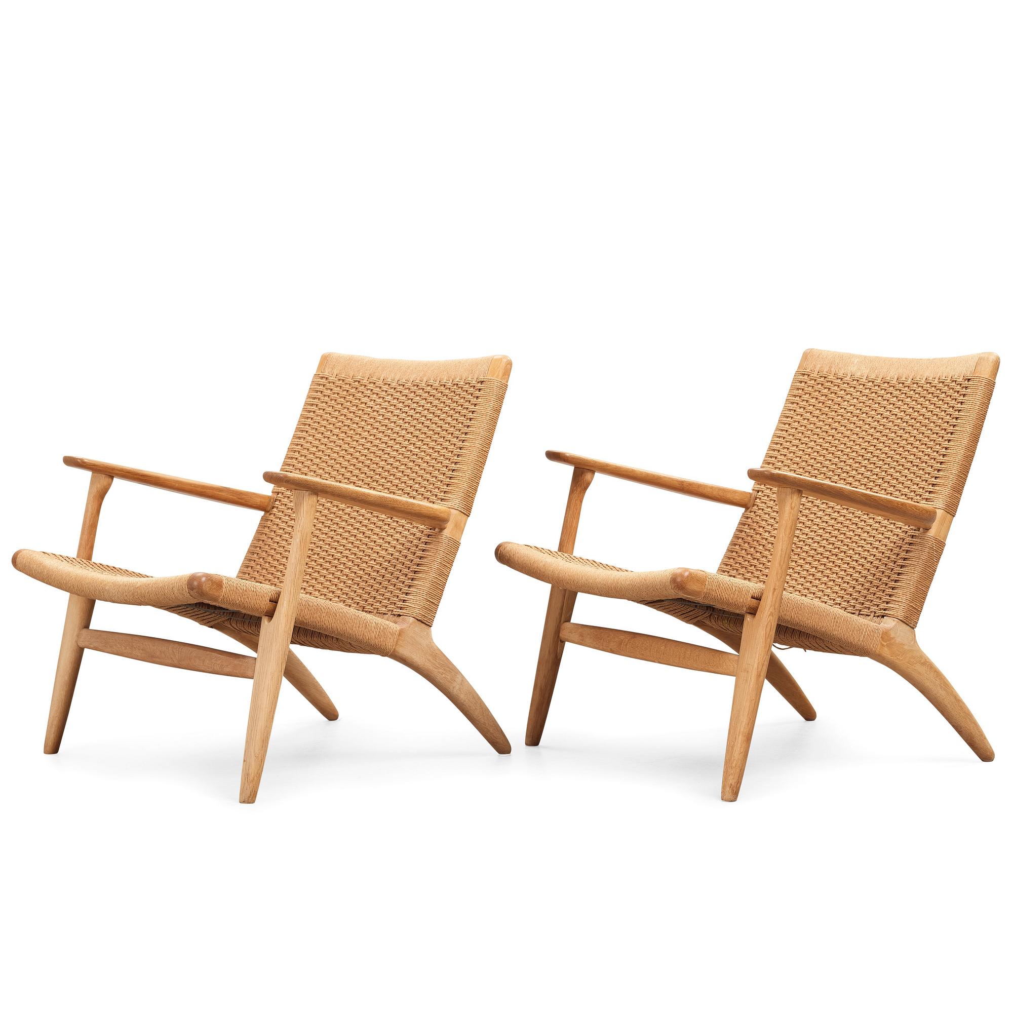 Hans J. Wegner, a pair of oak "CH-25" armchairs, Carl Hansen & Son, Denmark.