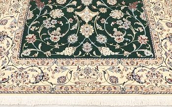 A part silk Nain rug, so-called 9LAA, approx. 257 x 161 cm.