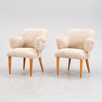 A pair of 'Lilla Sällskapet' armchairs by Carl Malmsten, second half of the 20th Century.
