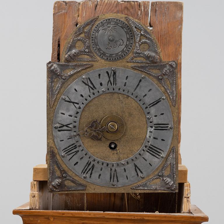 A painted long case clock, 19th Century.