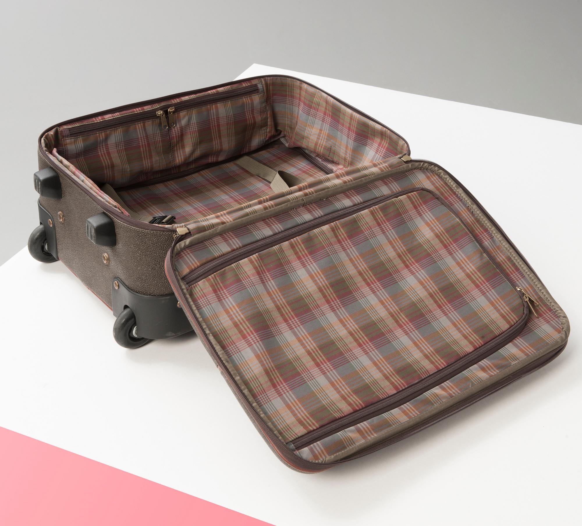 A hardsided trolley by Mulberry.
