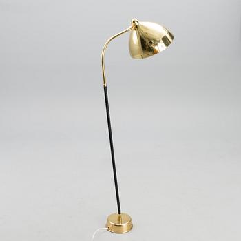 A 1940s floor light manufactured by Orno.