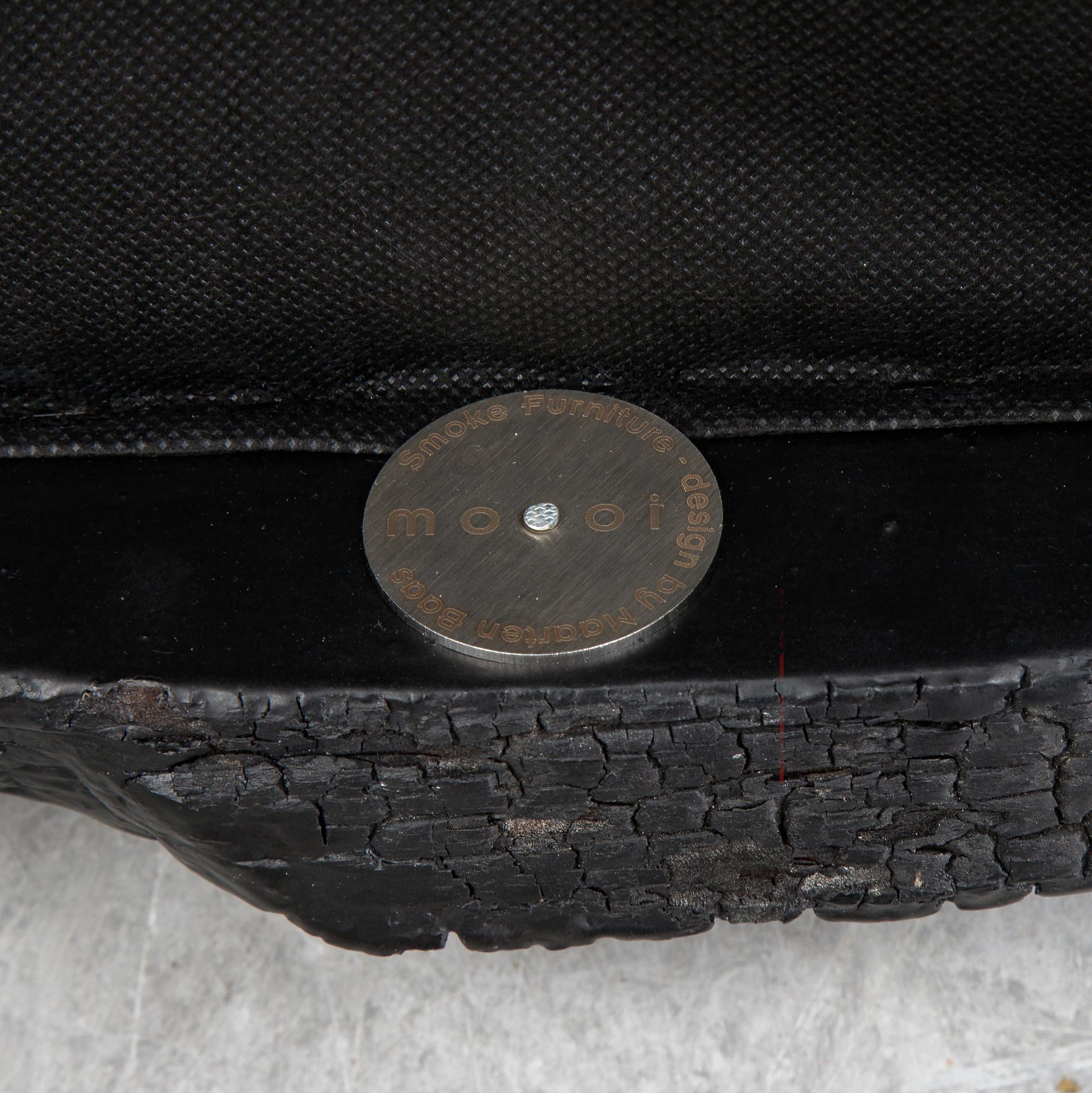 Maarten Baas, a promotional "Smoke dining chair" for Moooi,  after 2002.