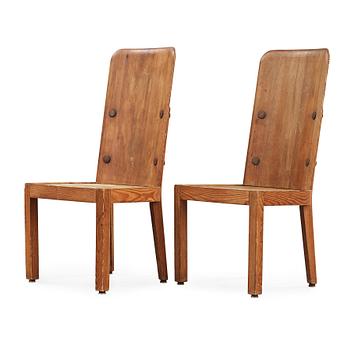 458. Axel Einar Hjorth, A pair of stained pine chairs, 'Lovö', Nordiska Kompaniet, Sweden 1930's.