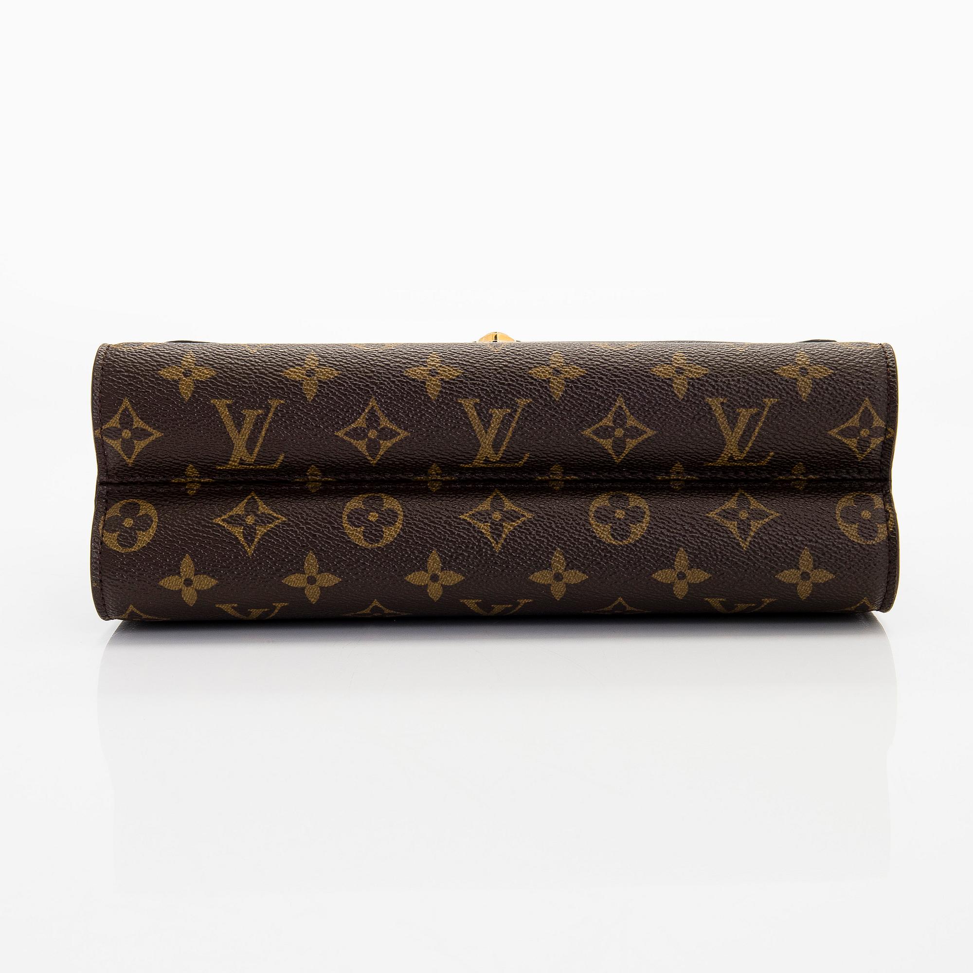 Louis Vuitton, a Monogram 'Victoire' bag.