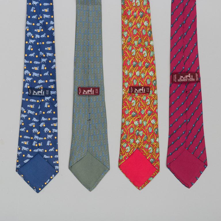 A set of four silk ties by Hermès.