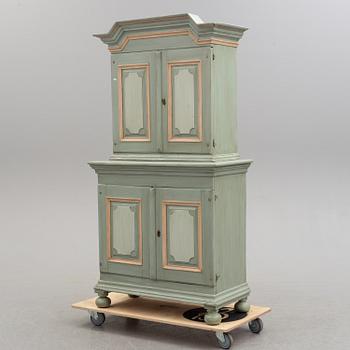 A 19th century painted cabinet.