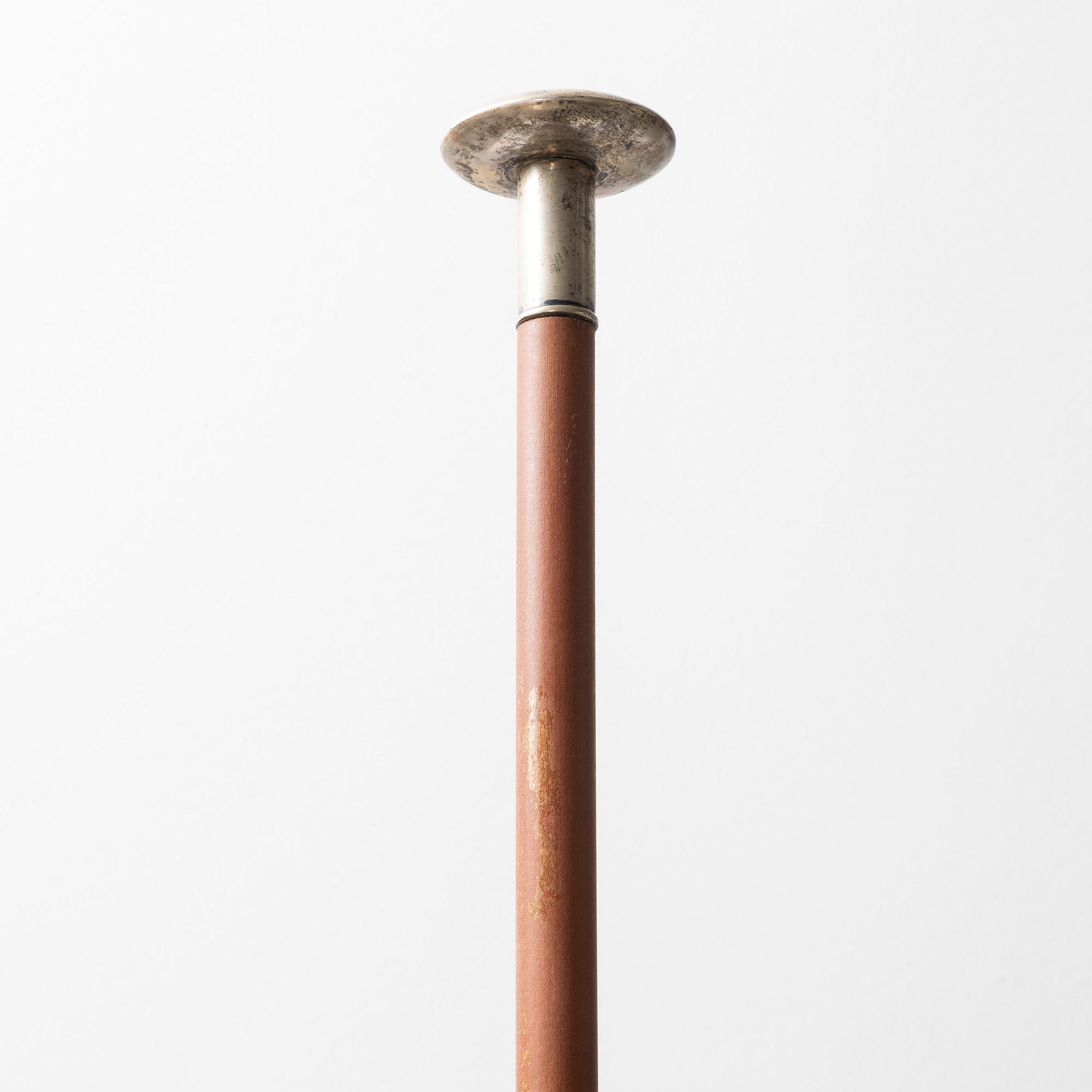 A wooden riding crop with silver mountes knob, 1929, Sweden, price from a horse jumping contest.