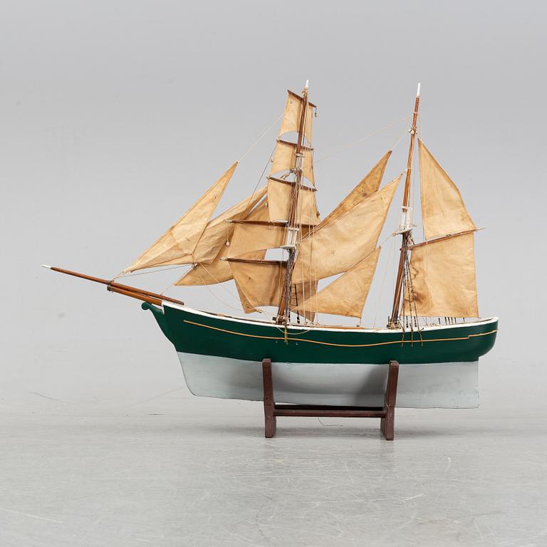 A model of a ship, mid 20th century.