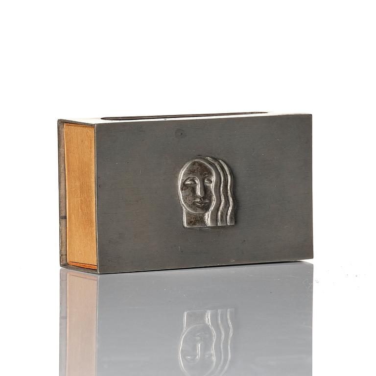 Firma Svenskt Tenn, a pewter matchbox case with beaker, models "38d" and "185a", with decor by Anna Petrus, Stockholm 1927-28.