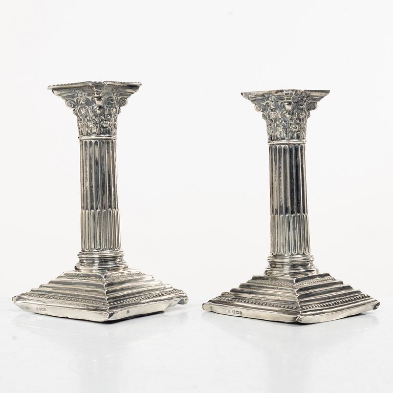 A pair of English silver column candlesticks, mark of Walter Latham & Son, Sheffield, 1910.