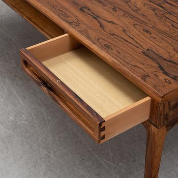 A 1960's rosewood coffee table.