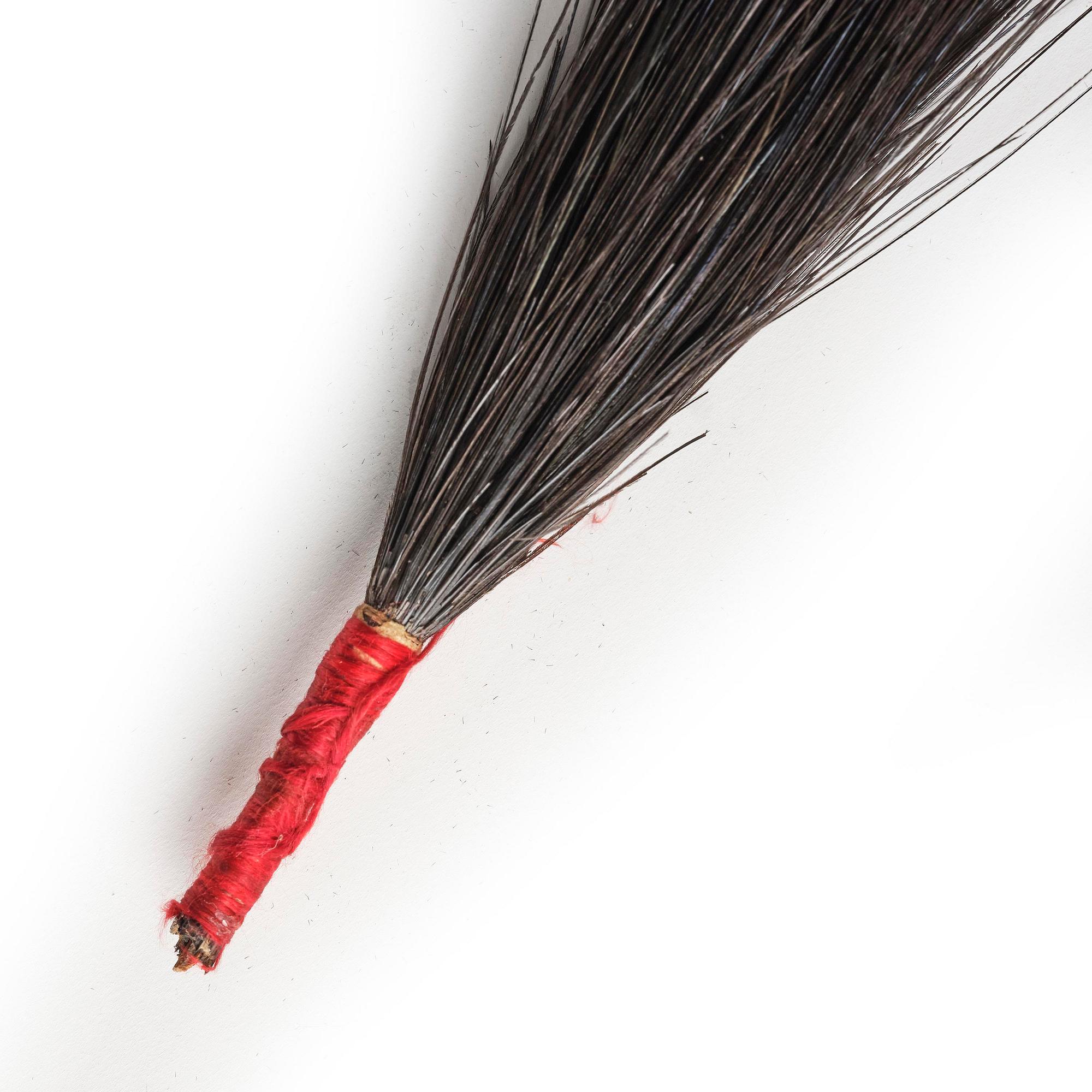 Two boxes with a mandarin's summer hat and black satin autumn hat and feather with six mandarin hat insignias.