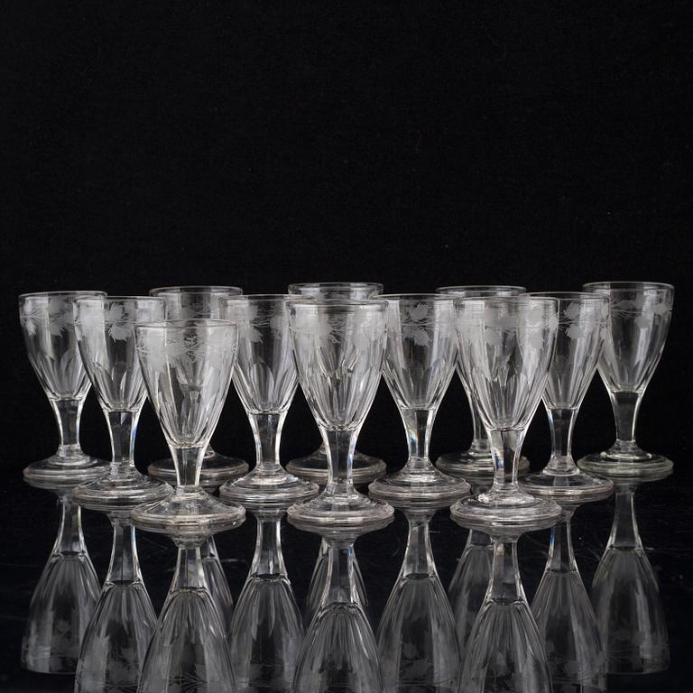 Twelve early 19th century wine glasses.