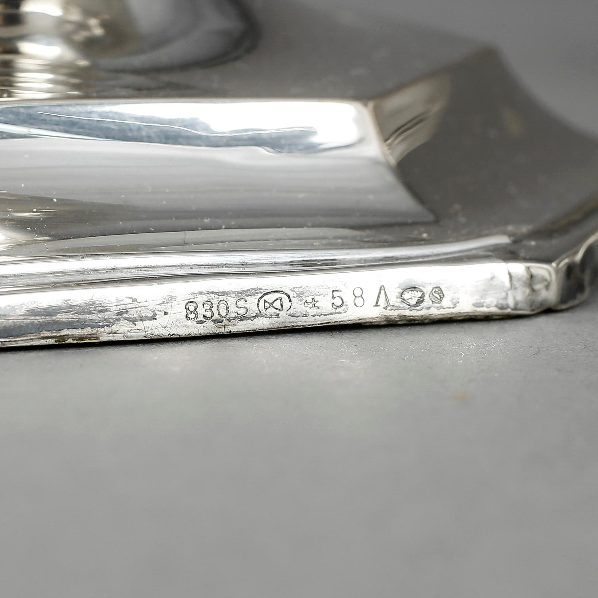 LJUSSTAKAR, ett par, silver, svenska importstämplar, 1900-tal.