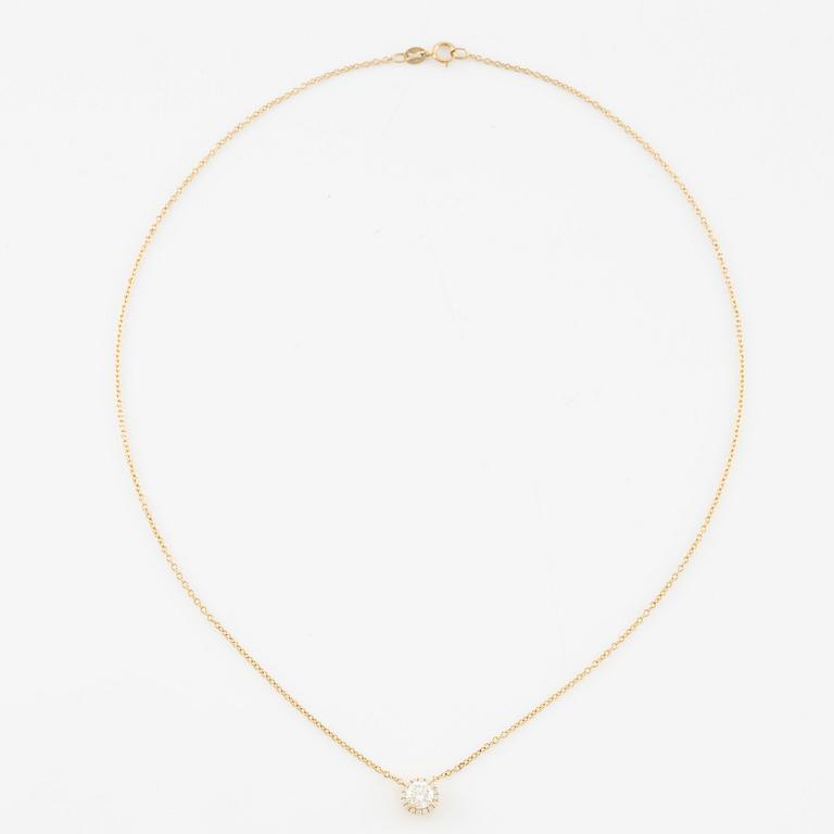 Collier 18K guld med briljantslipade diamanter.