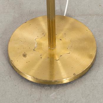 A BRASS FLOOR LAMP MID 20TH CENTURY.