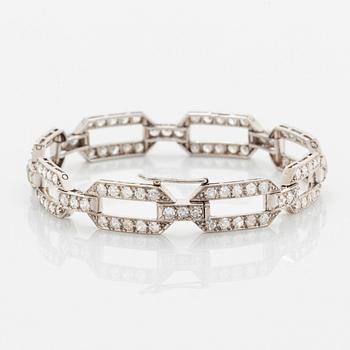 A platinum bracelet set with old-cut diamonds.