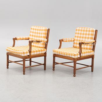 A pair of chairs and a sofa, first half of the 20th Century.