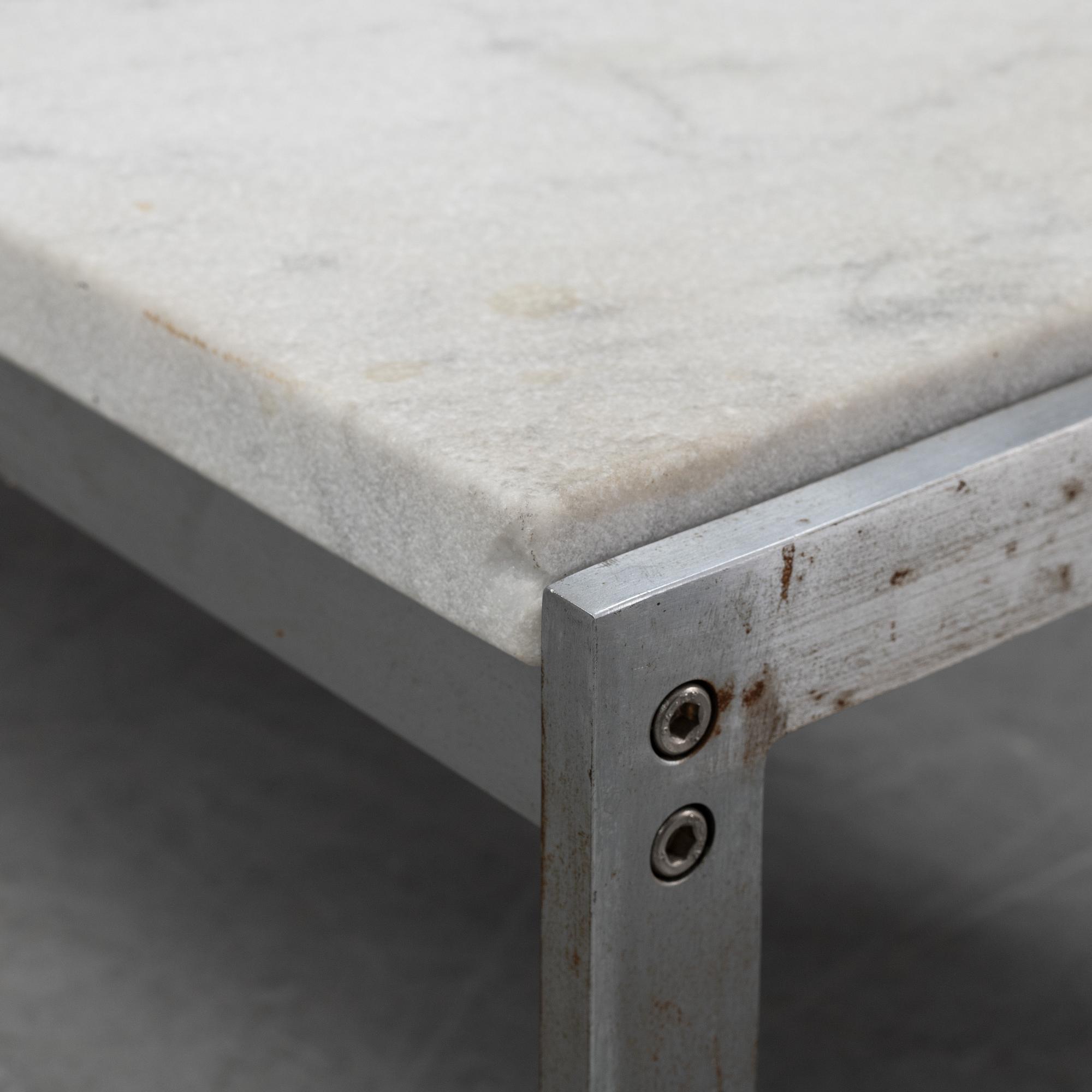 Poul Kjaerholm, a marble top 'PK 61' table, Fritz Hansen, Denmark, 1989.