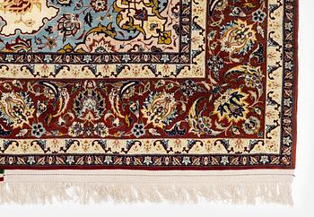 An Isfahan carpet, Central Persia, signed Akbaroff, c. 315 x 205 cm.