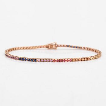 An 18K rose gold tennis bracelet with multi-coloured treated diamonds ca. 2.41 ct tot. according to engraving.