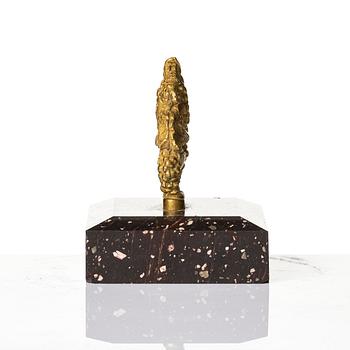 An Empire 'Loka-Risberg'-porhyry and ormolu paperweight, Älvdalen, early 19th century.