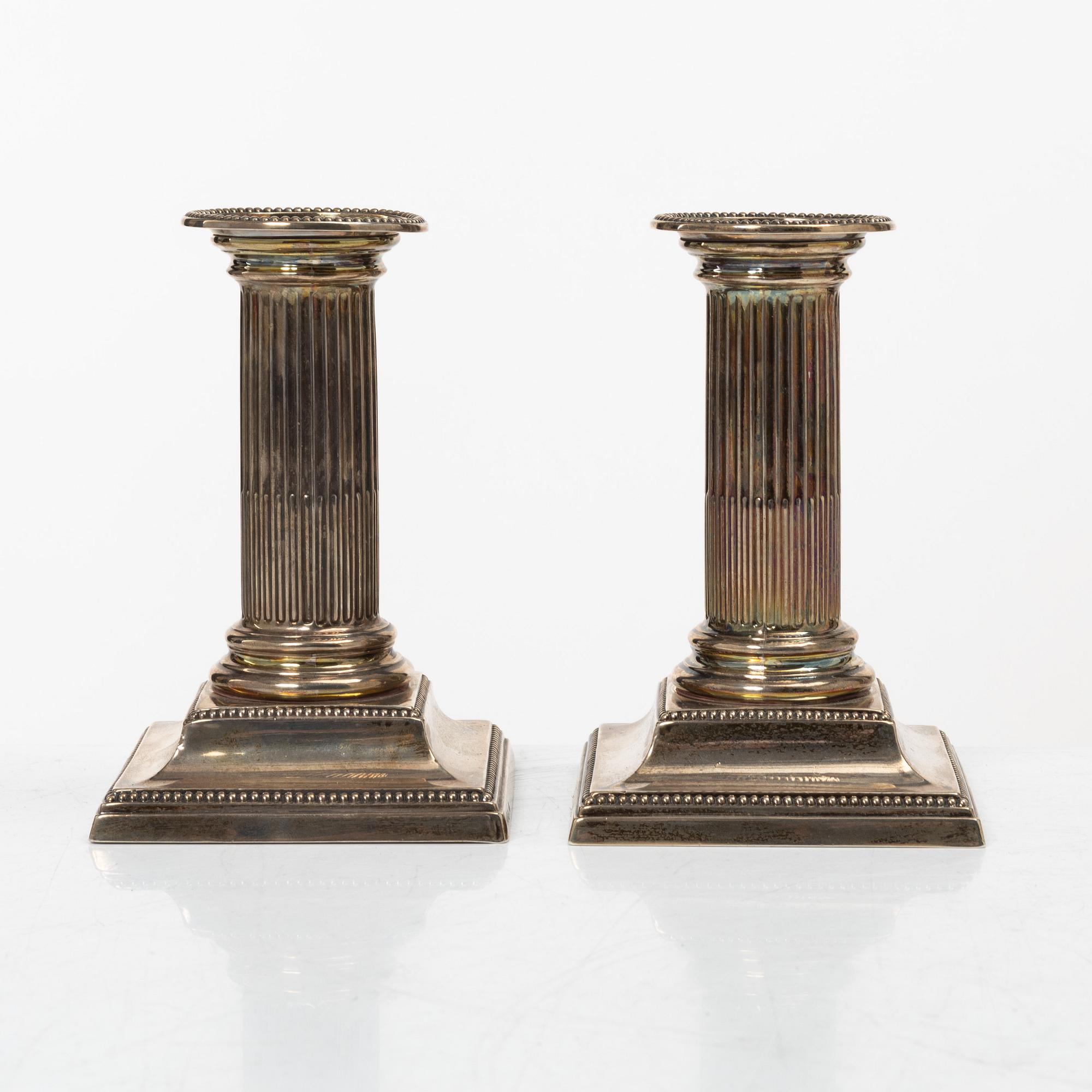 Hawksworth, Eyre & Co Ltd, a pair of silver candlesticks, Sheffield 1890.