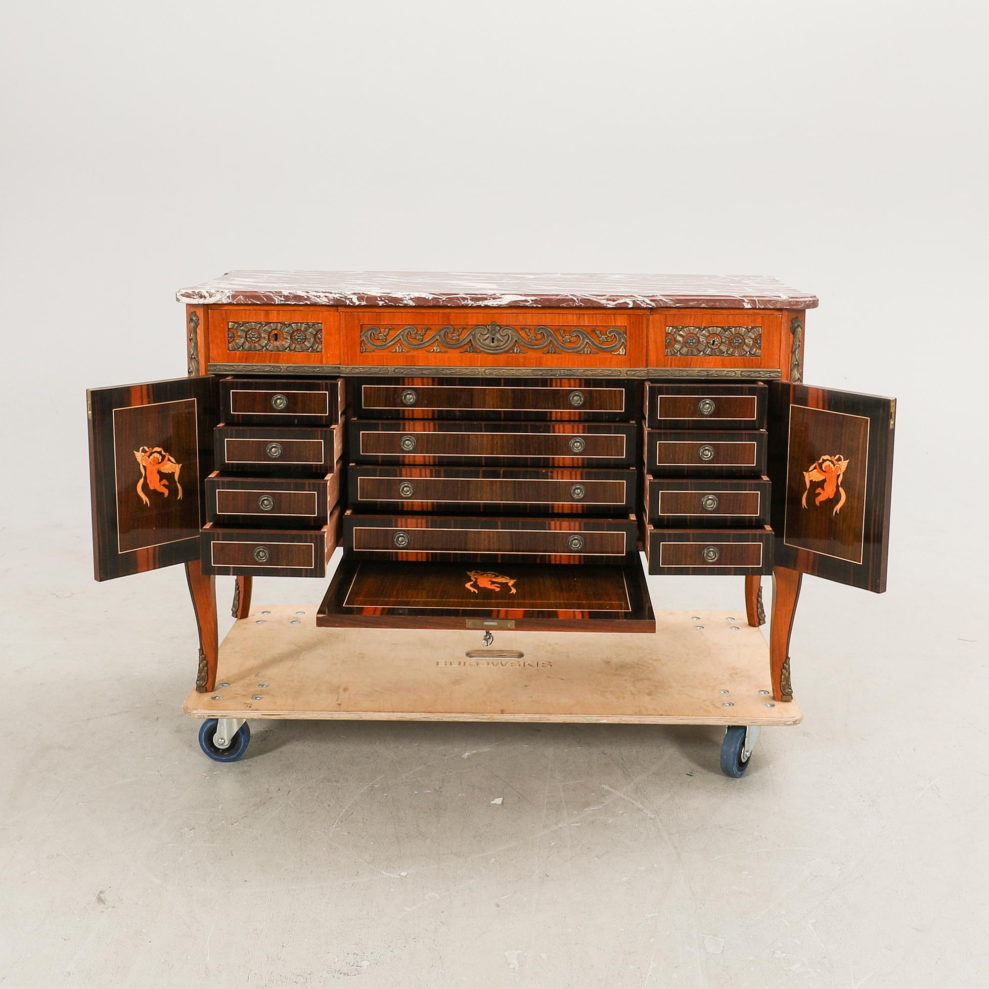 A mid 1900s Gustavian style mahogany dresser.