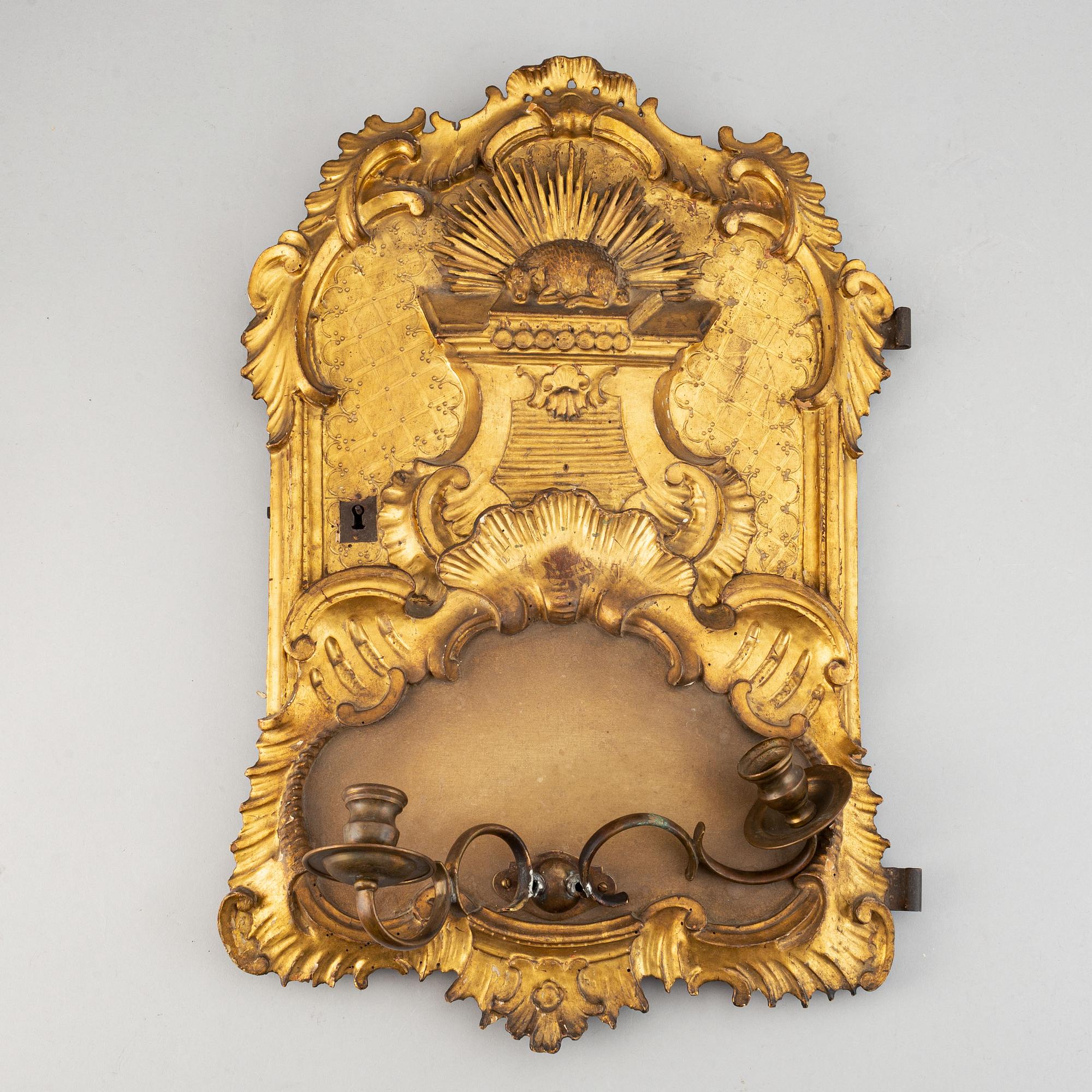 An 18th century  Rococo wall sconce for two candles.