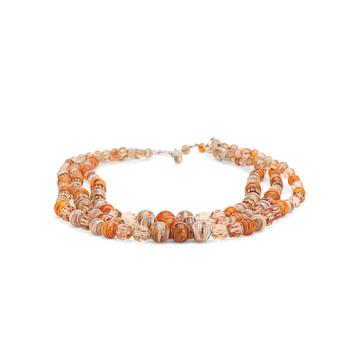 697. CHRISTIAN DIOR, an ambercoloured three strand glass beaded necklace, 1960s/70th.