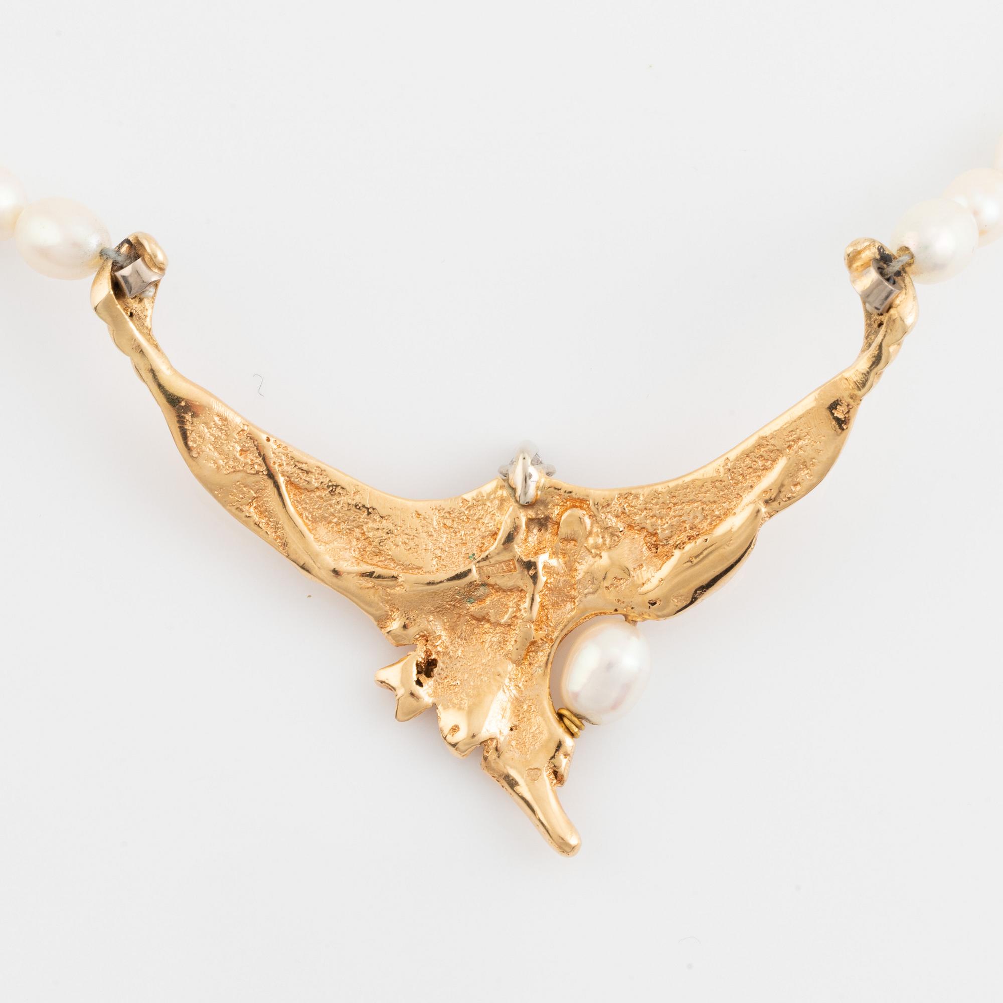 Cultured freshwater pearl necklace, with navette cut diamond and brilliant cut diamonds.