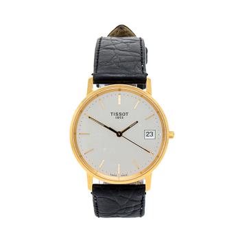 A Tissot 14 ct gold wrist watch 34 mm.