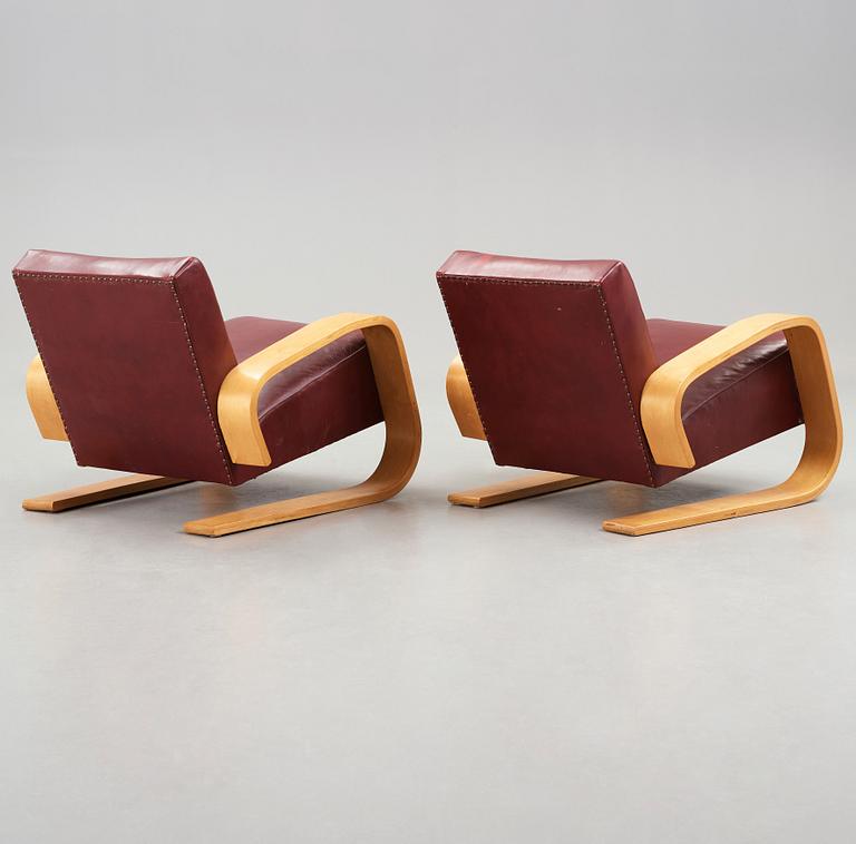 Alvar Aalto, A pair of Alvar Aalto tank easy chairs, model 400 probably by Huoneakalu-ja Rakennustyötehdas Oy, Finland, for Artek,