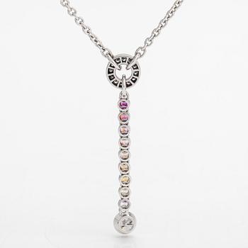An 18K whitegold necklace with a diamond ca 1.01 ct, smaller diamonds tot. ca 0.15 ct, ruby and 
sapphires, Helsinki.