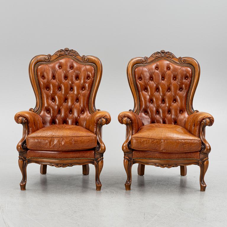 A pair of leather armchairs, second half of the 20th century.