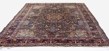 A carpet, Antique/semi-antique Kerman, ca 340 x 220 cm.