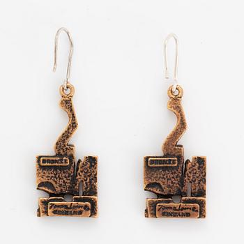 A pair of Jorma Laine earrings in bronze.