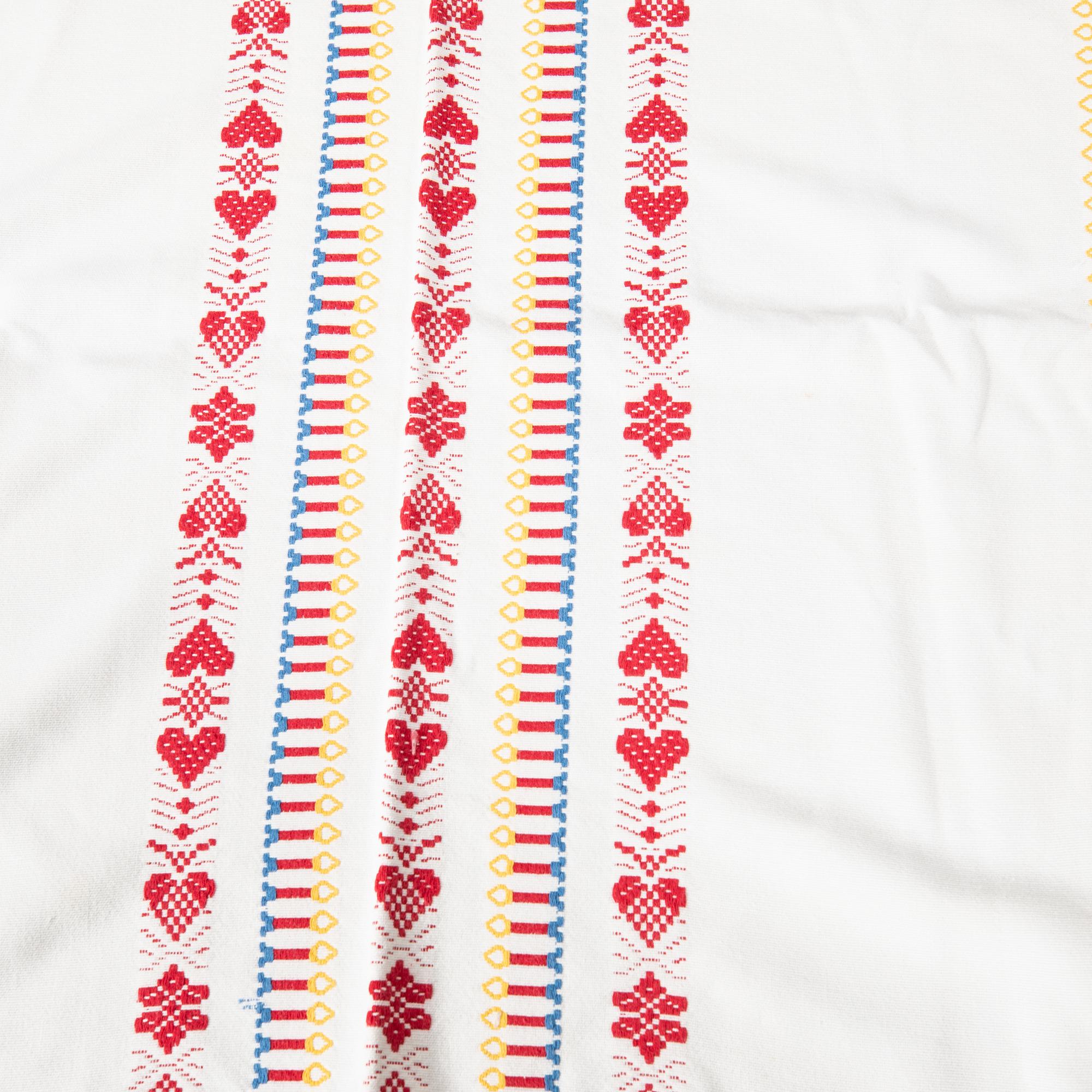 A collection of Christmas tablecloths 12 pcs first half/mid 20th century.