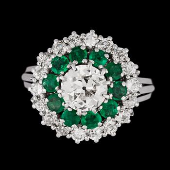 341. An old cut diamond, app. 1.70 ct, and emerald ring.