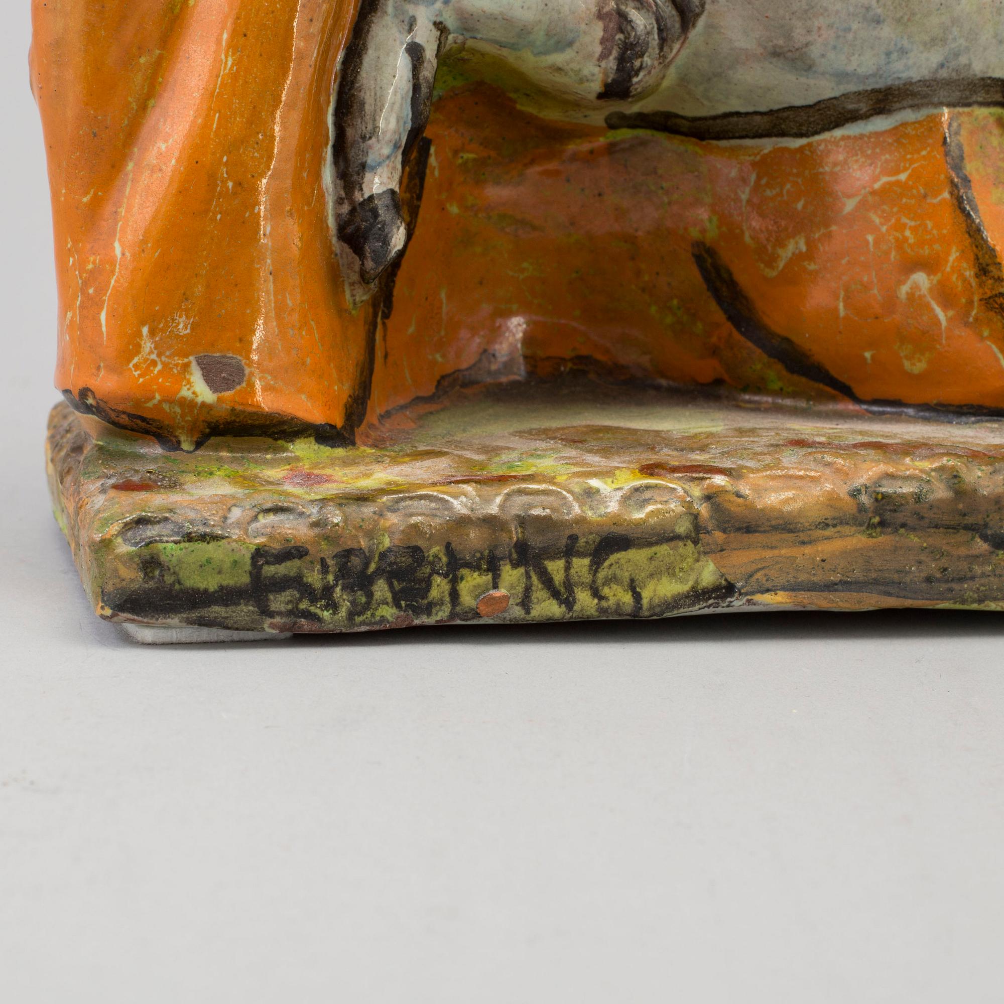 ALLAN EBELING, a pottery figure, signed Ebeling.