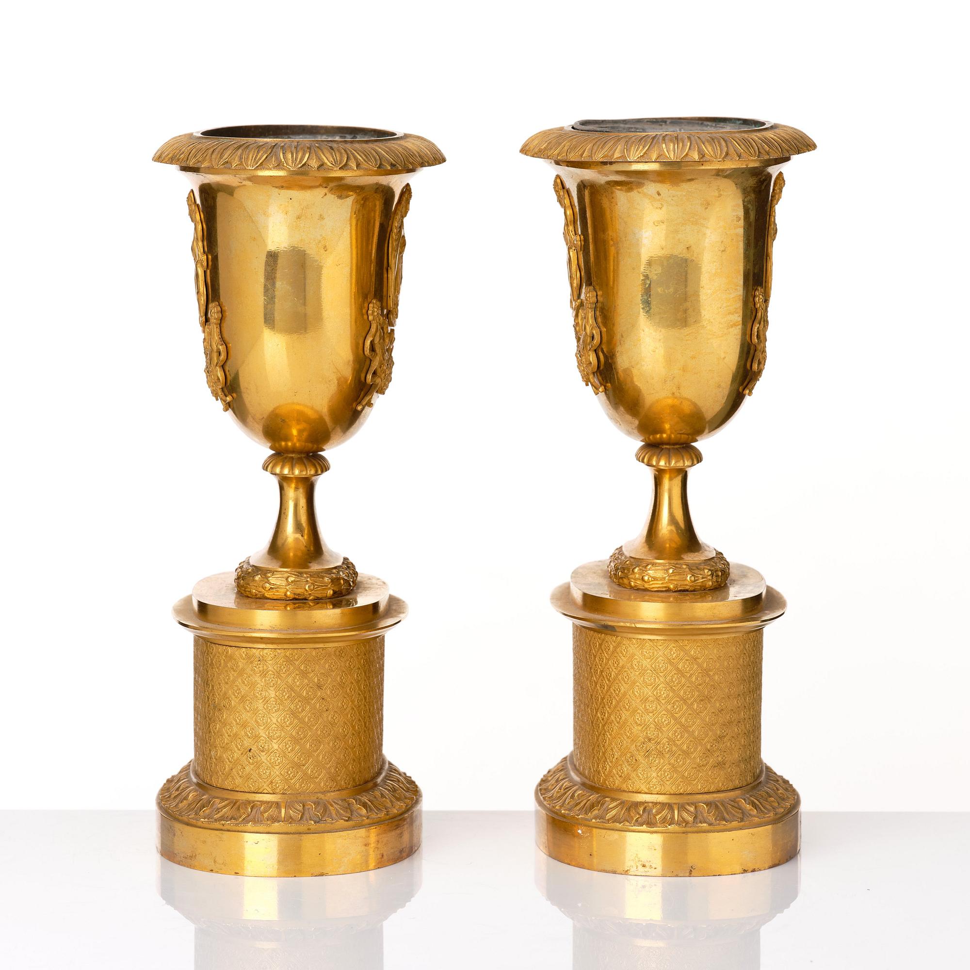 A set of three French Empire early 19th century gilt bronze centre pieces.
