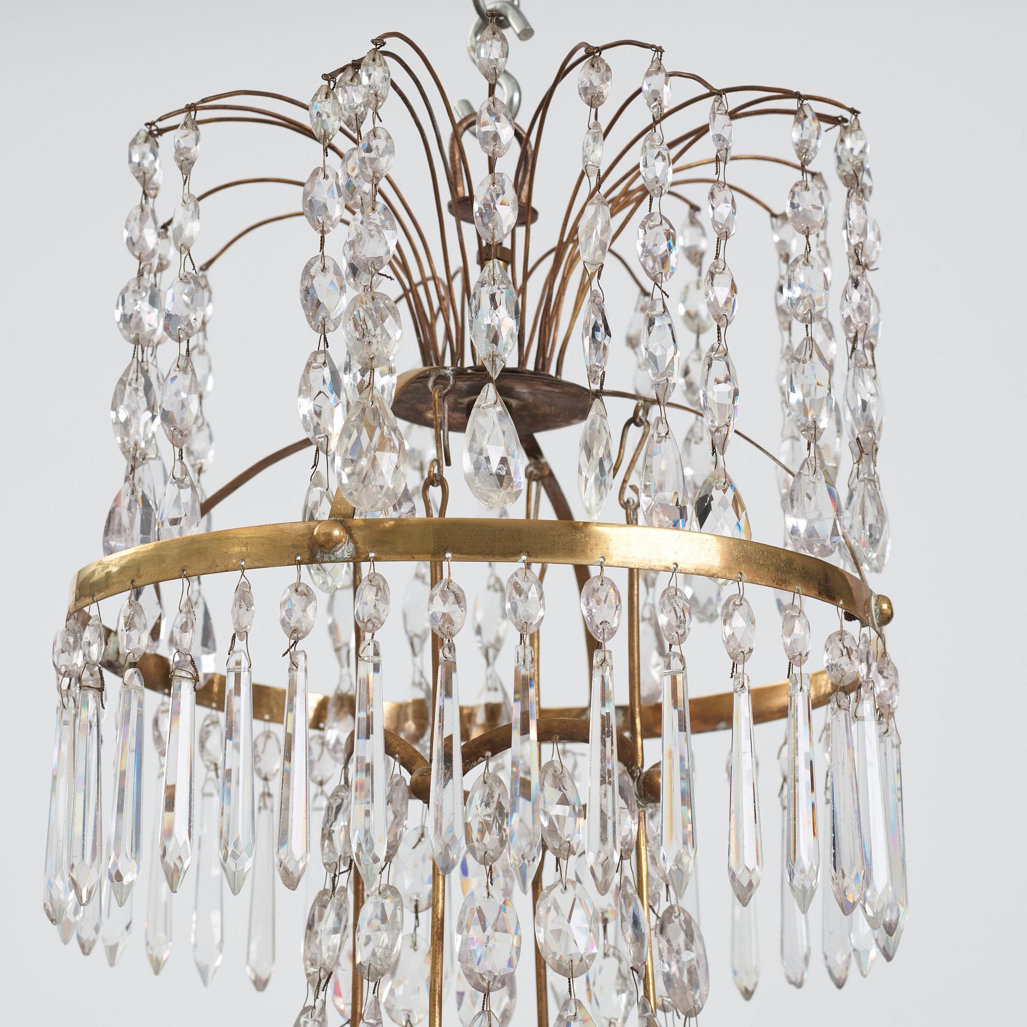 A late Gustavian nine-light chandelier, early 19th century.