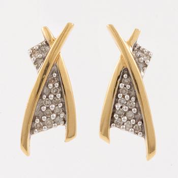 Earrings, 18K gold with small diamonds.