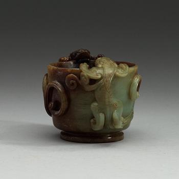 A Chinese nephrite cup with handles.