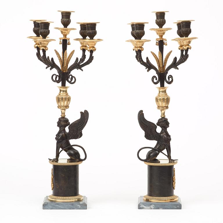 A pair of Russian Louis XVI-style 19th century five-light candelabra.