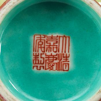 A famille rose bowl, Qing dynasty, with Jiaqing mark.