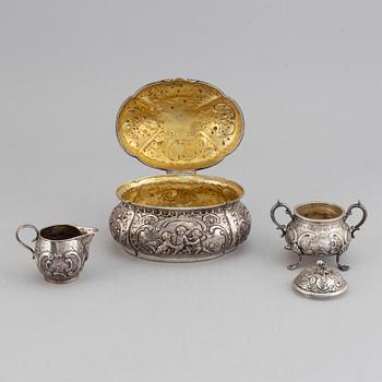 A german silver 800 sugar box, creamer and sugar bowl.